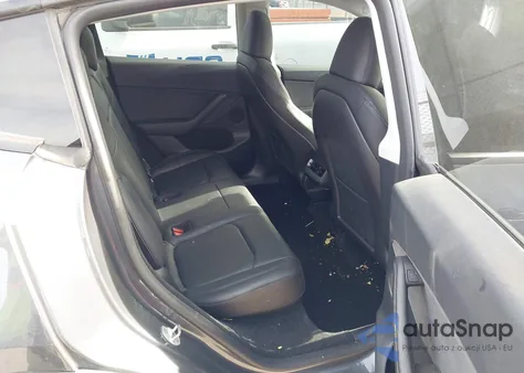 2023 Tesla Model Y Rwd из США, поврежденный, VIN 7SAYGDED9PF958702